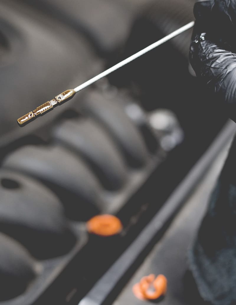 Engine Oil Check A close-up of a dipstick, as part of an oil change